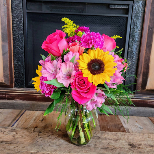 Pink Lemonade bouquet with sunflowers and pink flowers for the National Sweetheart Pageant during the National Sweet Corn Festival in Hoopeston, Illinois.