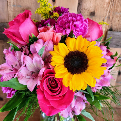 Pink Lemonade bouquet with sunflowers and pink flowers for the National Sweetheart Pageant during the National Sweet Corn Festival in Hoopeston, Illinois.
