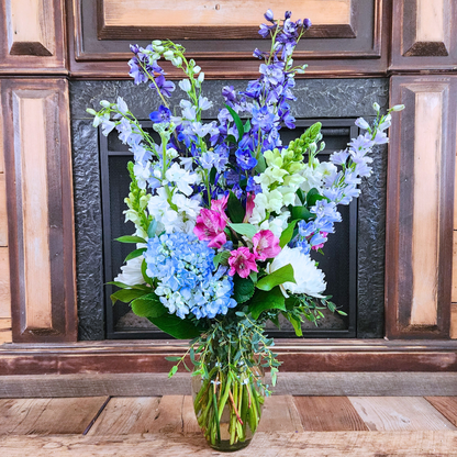 Cotton Candy Skies blue, white and pink National Sweetheart flower bouquet by Treasured Roots Flower Shop in Hoopeston, Illinois
