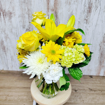 You Are My Sunshine yellow and white flower bouquet for the National Sweetheart Pageant during the National Sweet Corn Festival in Hoopeston, Illinois.
